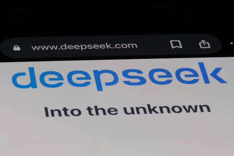 Computer screen with deepseek logo and the words into the unknown underneath it.